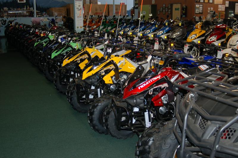 Sales Floor 3 22 13 (12)   Just a beginning of the 125cc class area for kids ATVs.