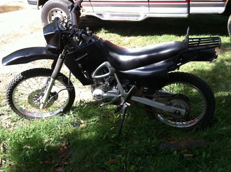 The bike was blue/yellow when i first got it then i painted it black after a few months I started my bobber/Rat bike project